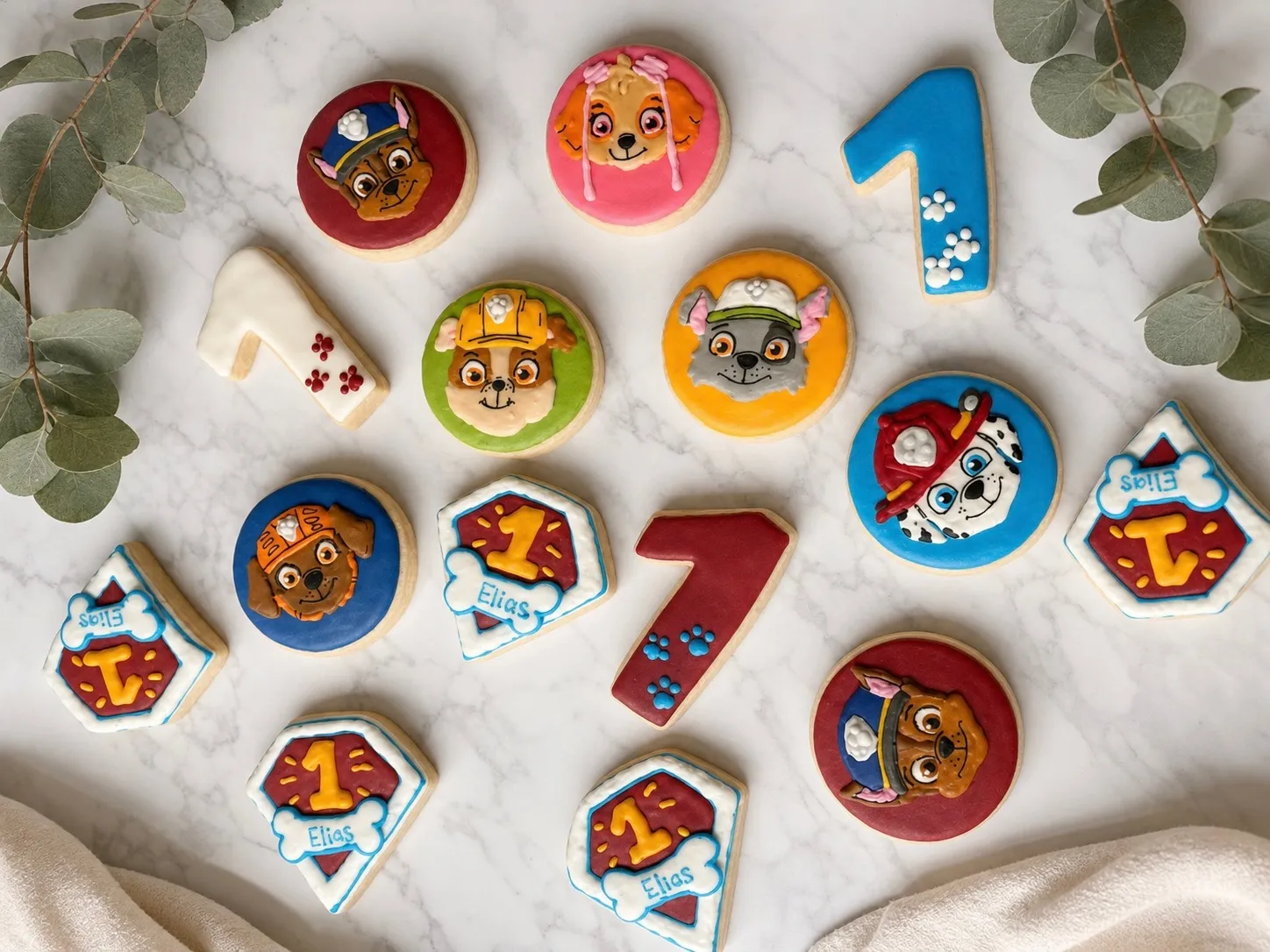Paw Patrol character cookies with iced number cookies